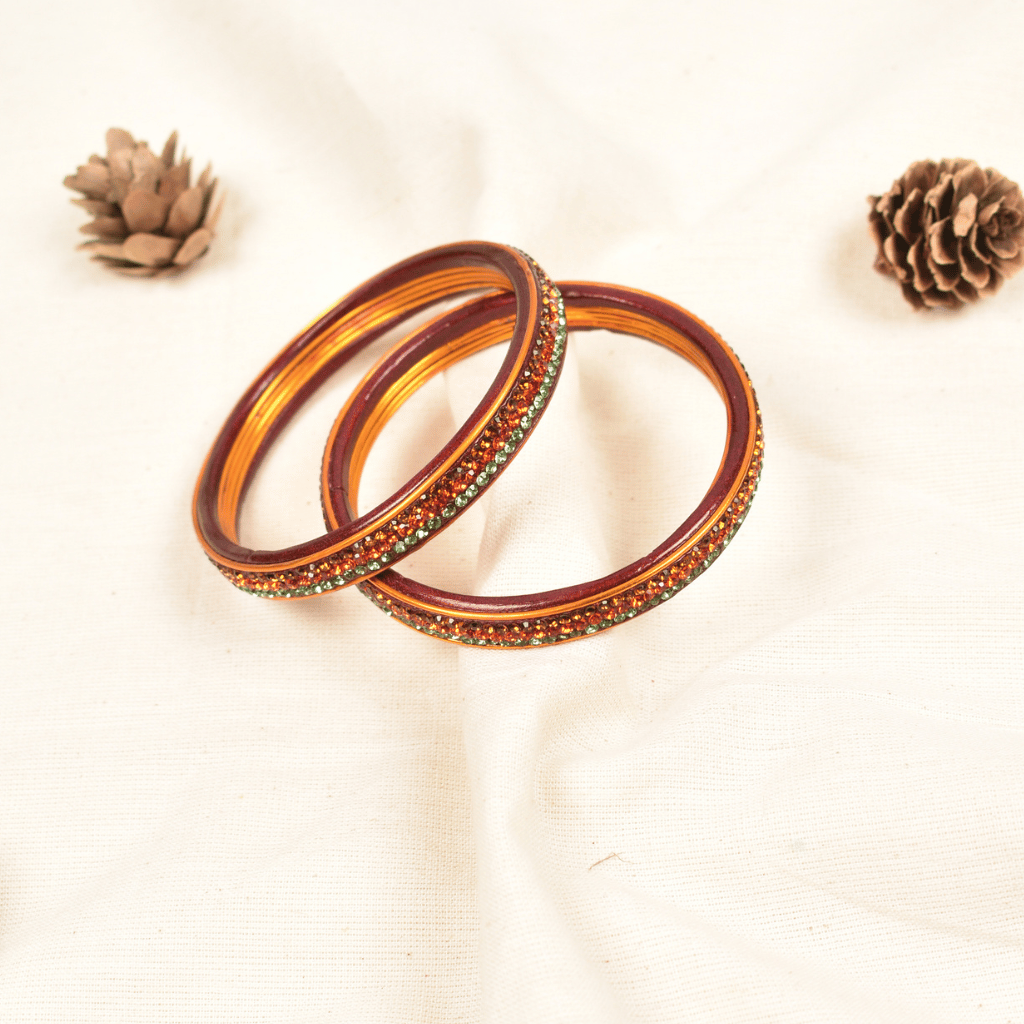 Pair of orange 3 line stoned lac bangles - glittery
