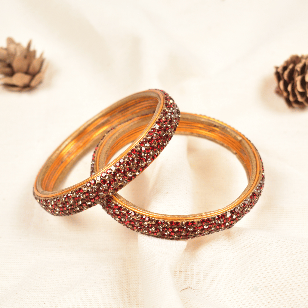 Pair of gold & maroon 5 line stoned lac bangles 