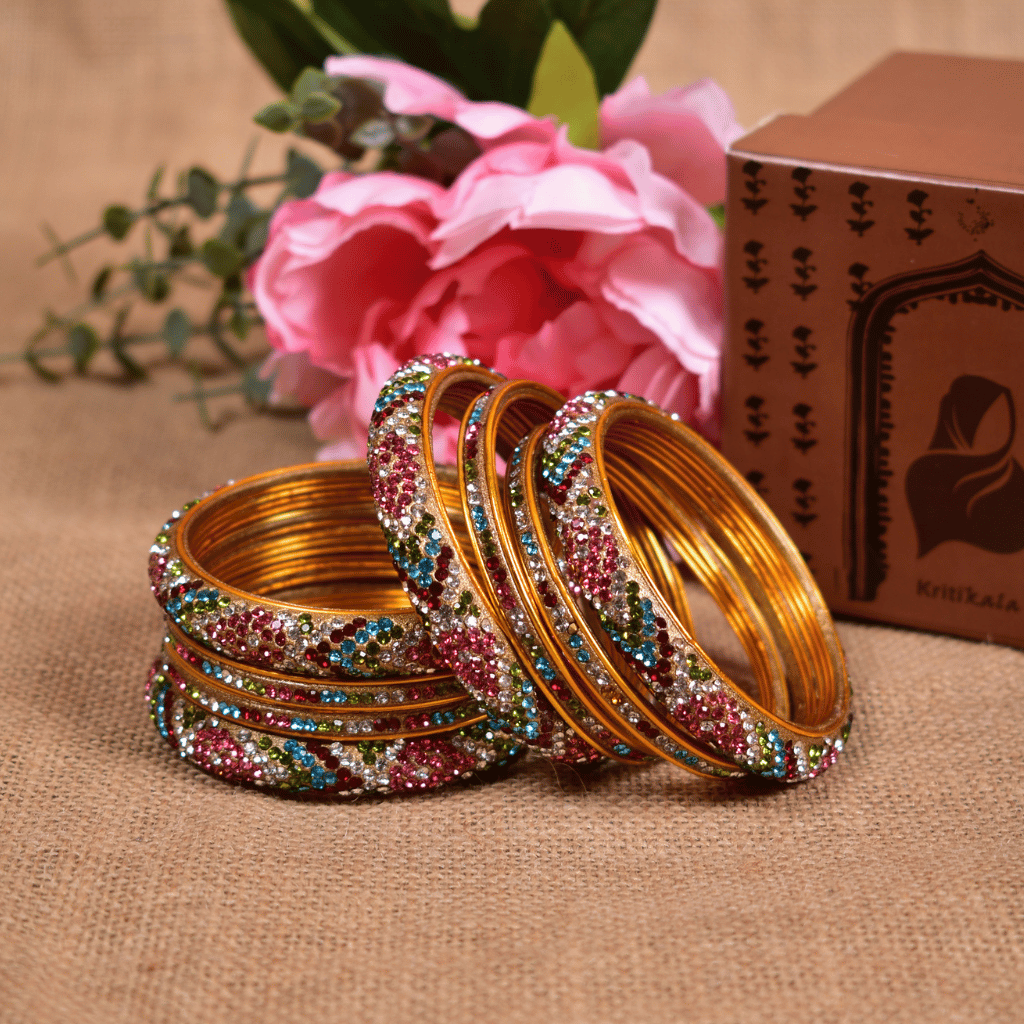 Set of eight bangles in pink & white tones