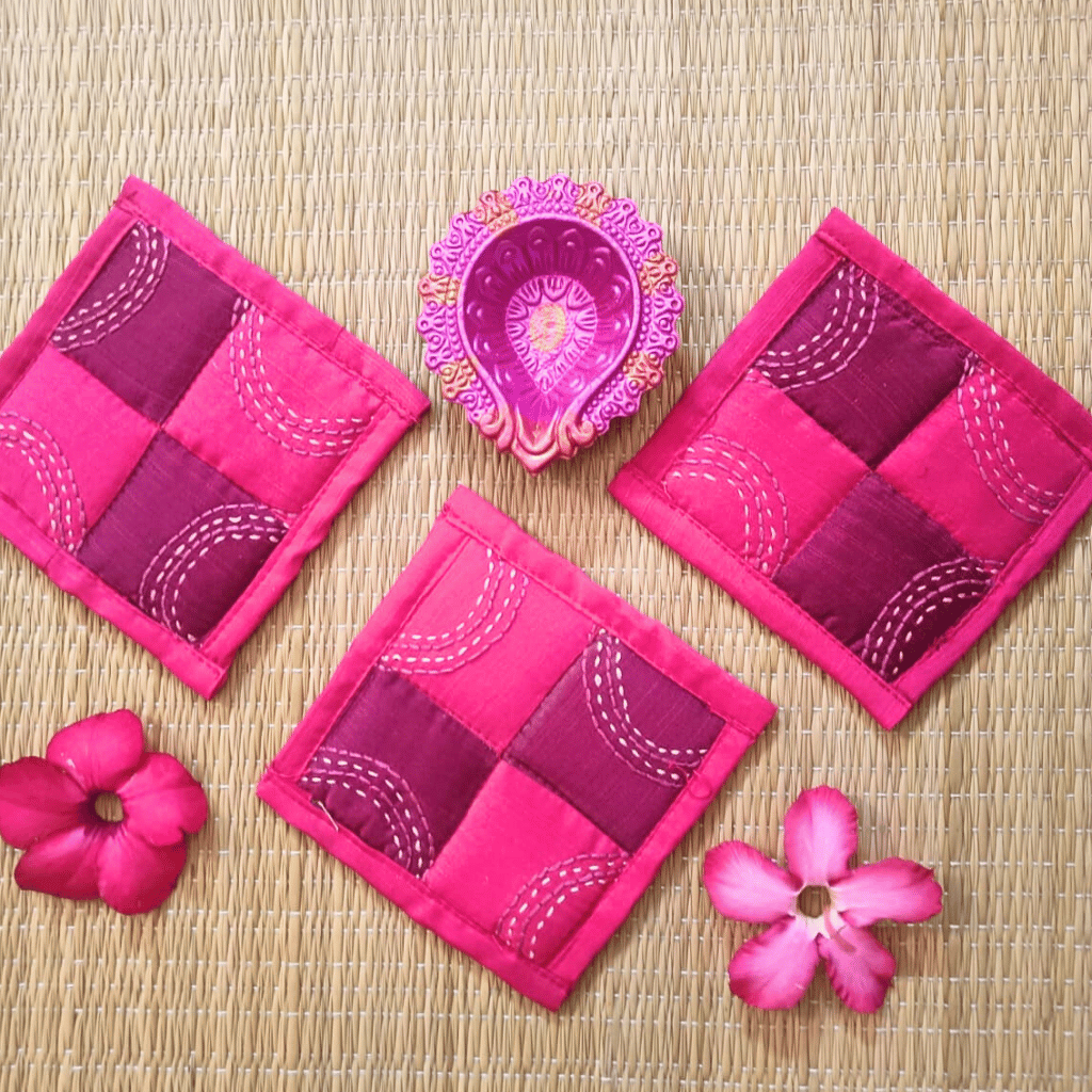 Set of 4 embroidered fabric coasters in pink & maroon