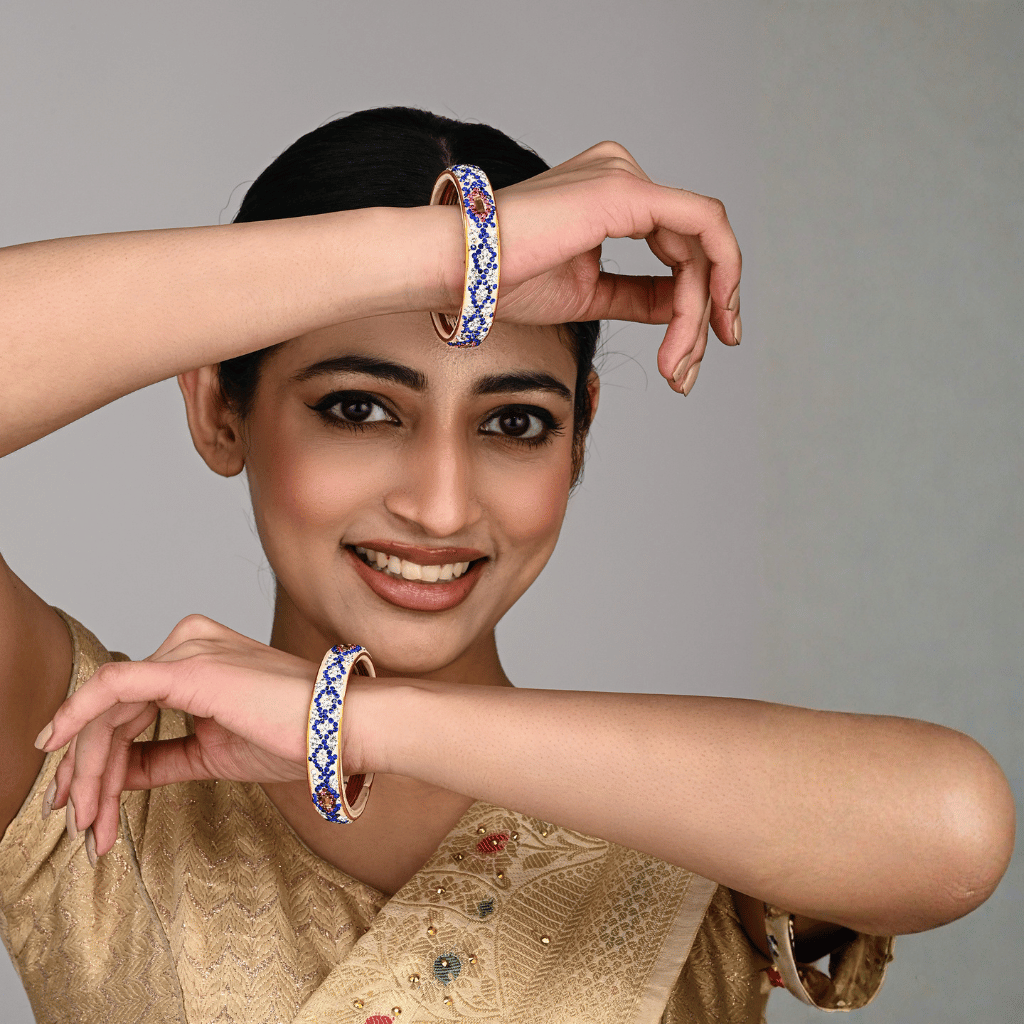 Pair of broad bangles in white and blue tones - Hyderabad