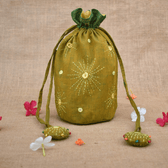 Yellow cylindrical potli bag with mirror embroidery