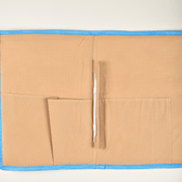 Simple natural jute file folder with a velcro tab and blue piping - pockets