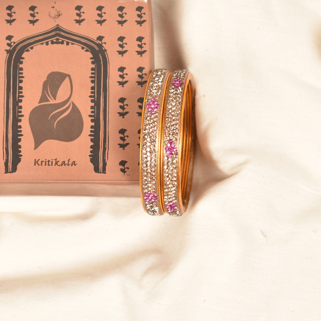 Pair of golden 3 line stoned lac bangles - Hyderabad
