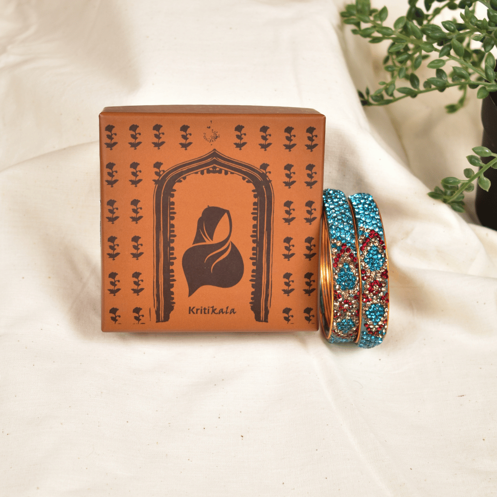 Pair of broad bangles in blue and maroon tones - Kritikala 