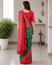 Green ikat saree with hand embroidery