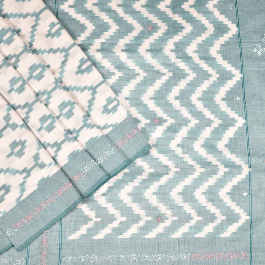 White ikat saree with hand embroidery