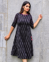 Black leaf ikat dress with tassels