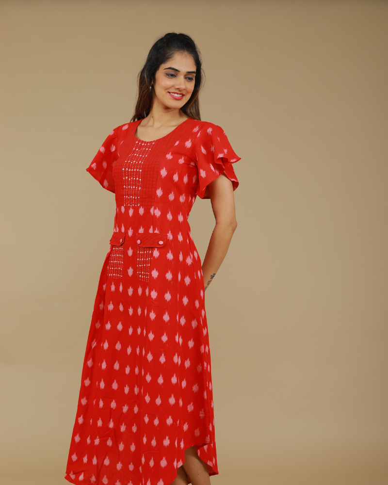 RED IKAT PLEATED DRESS WITH HAND EMBROIDERED POCKETS AND YOKE