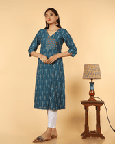 A symmetric Teal Blue Ikat Embroidery Kurta - embroidery