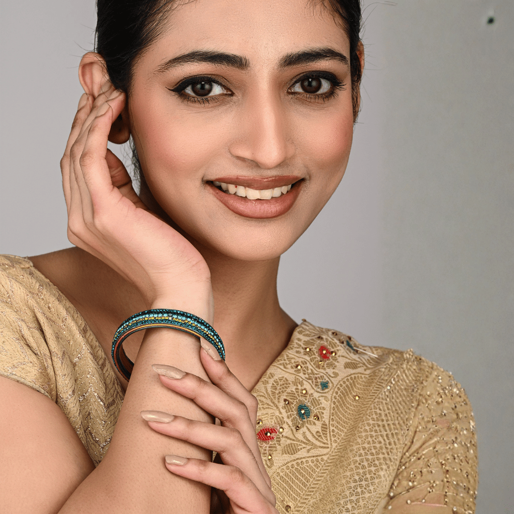 Pair of broad bangles in blue tones 