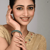 Pair of broad bangles in blue tones 