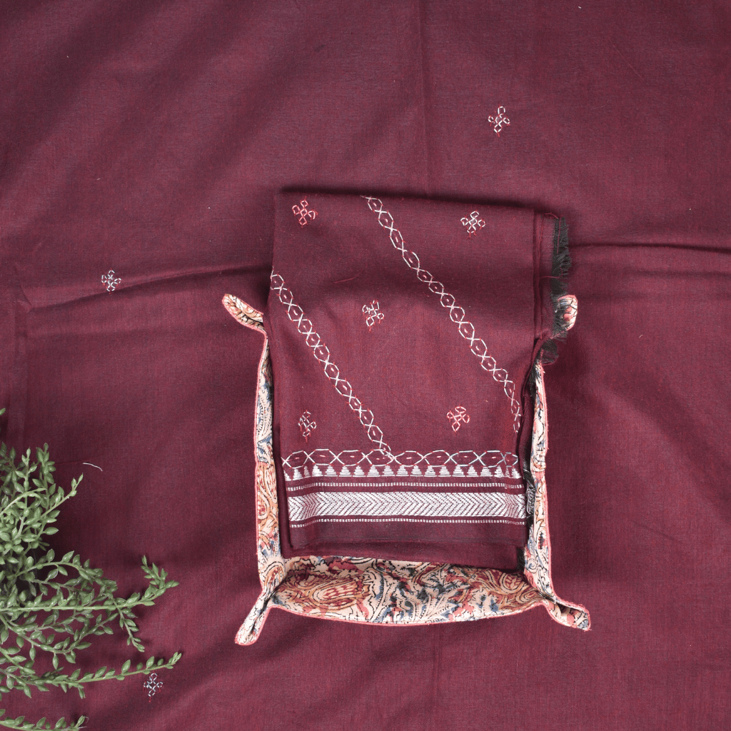 Maroon handloom saree with traditional banjara embroidery