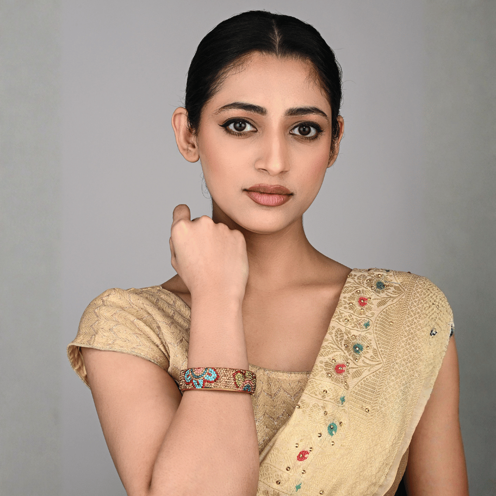 Ethnic gold toned stone studded kada made with lac 