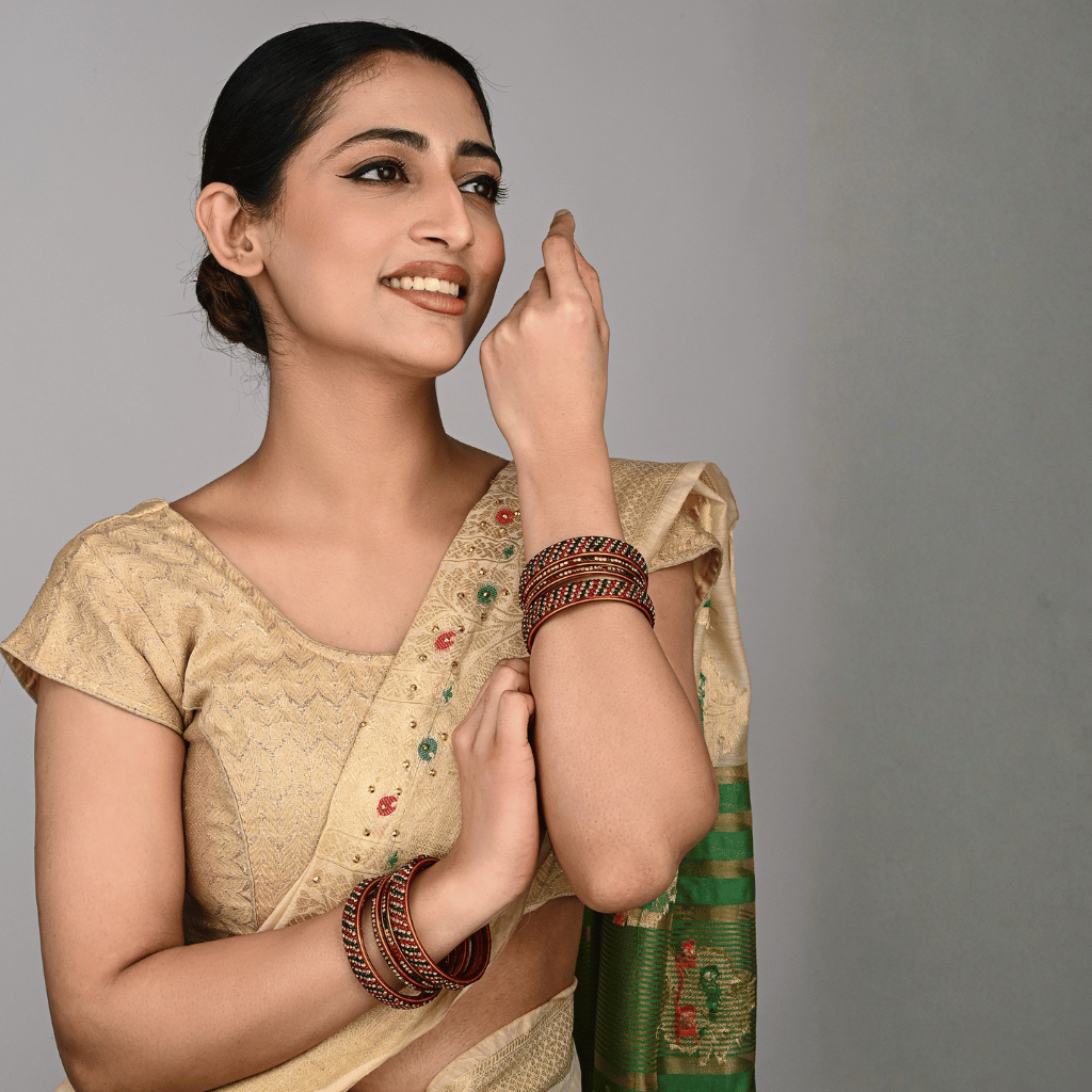 Set of  eight bangles in green & red tones