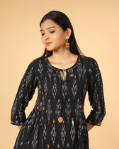 A Line Kurta in Black Ikat Cotton - tassel