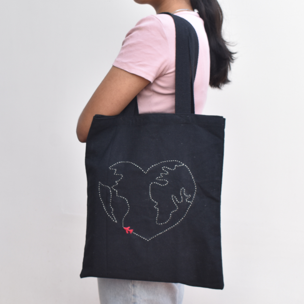 Black canvas tote bag with map design embroidery