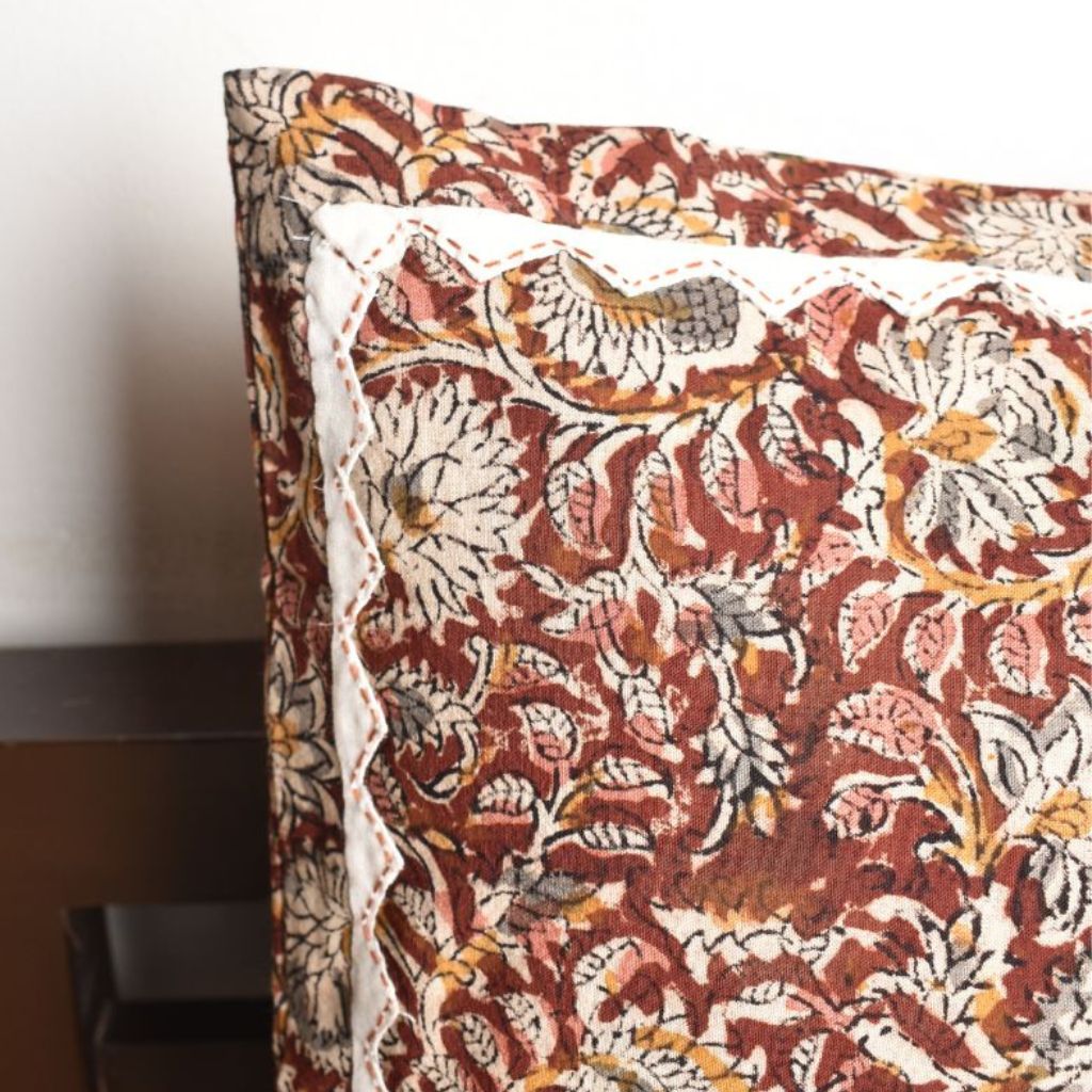 Brown Kalamkari cushion cover with applique