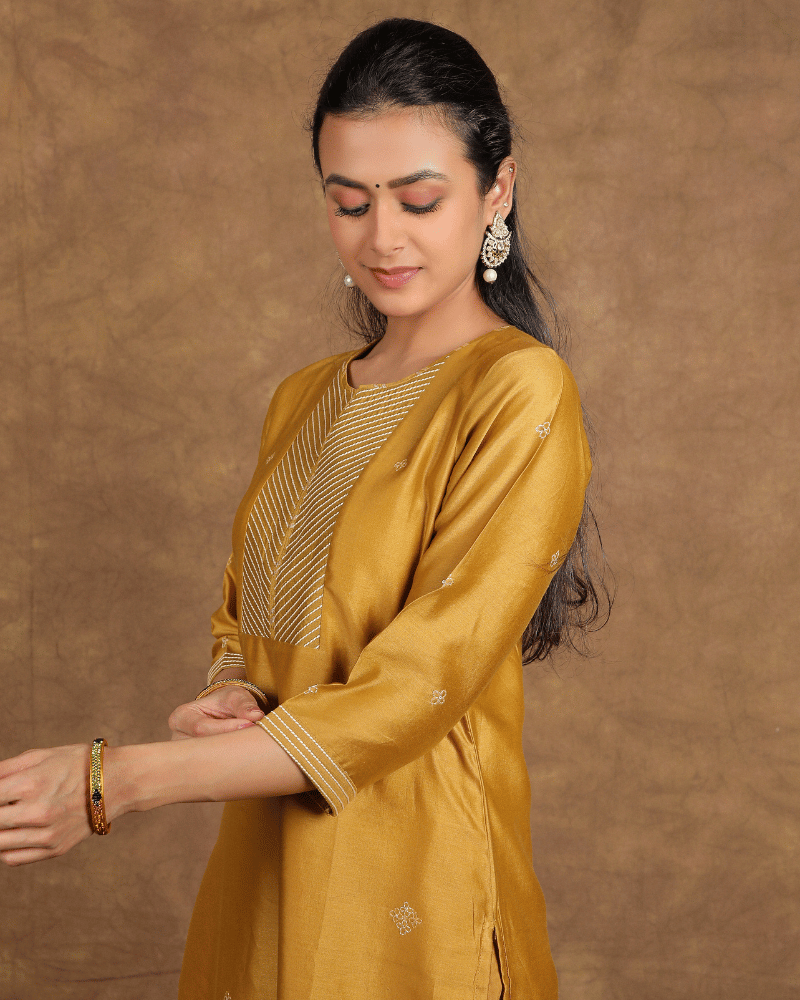 Guzaarish Chanderi Silk Kurta and Pant Set with embroidered yoke and sleeves in old gold