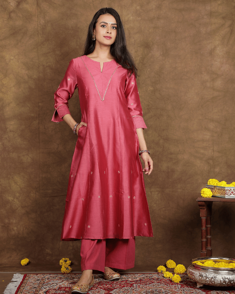 Fida A line Chanderi Silk Kurta and Pant Set with a v shaped yoke  and kalis in Onion Pink colour