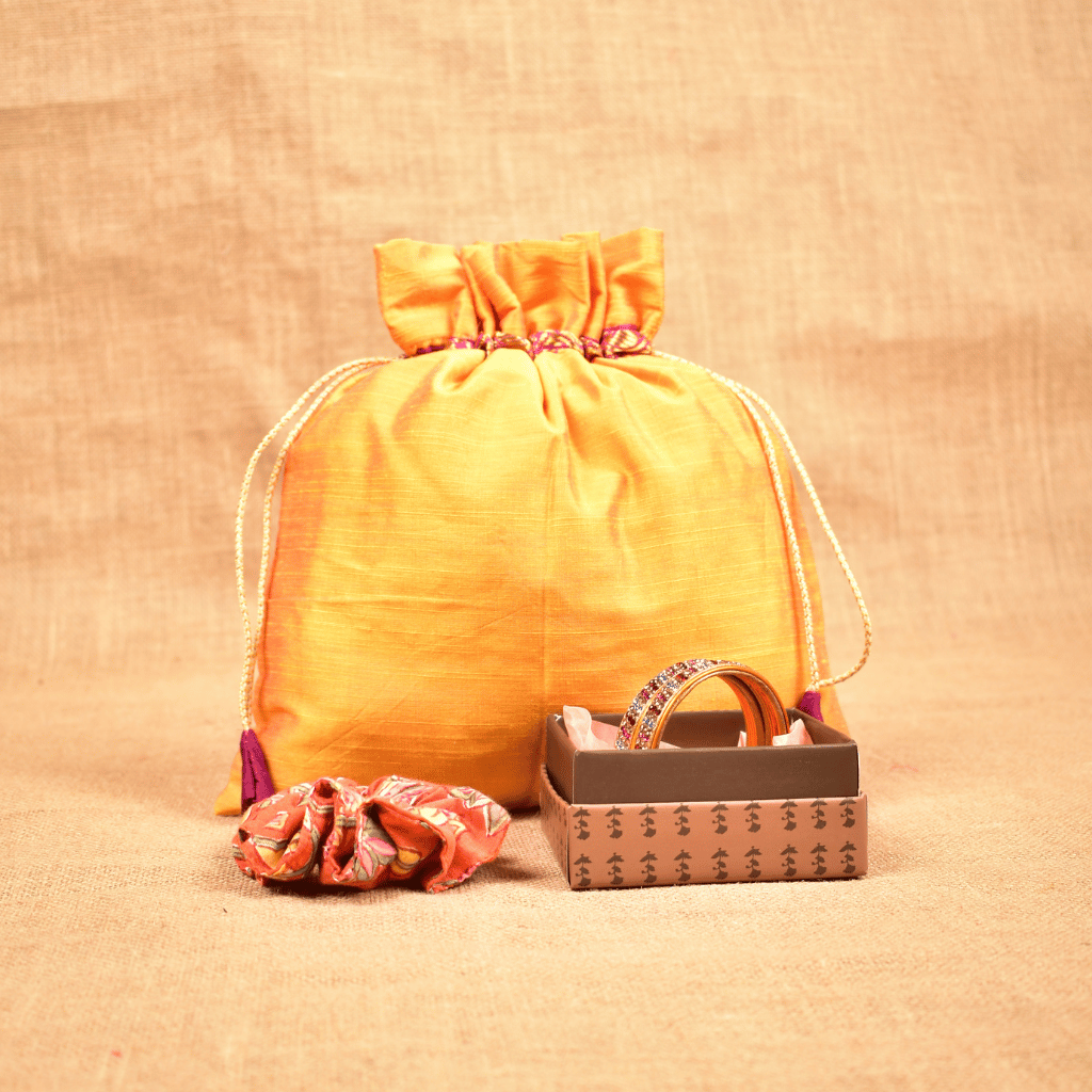 Festive return gift set - Lac bangles and scrunchie in a silk potli - pack