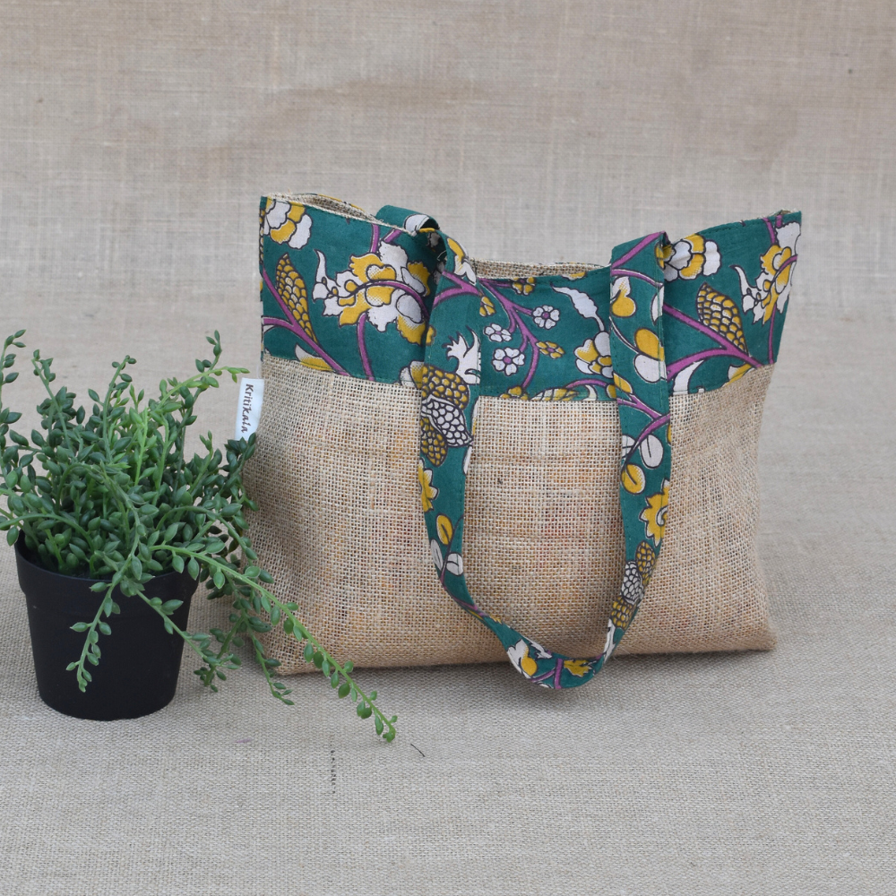 Soft jute tambulam or gift bag with green Kalamakri print