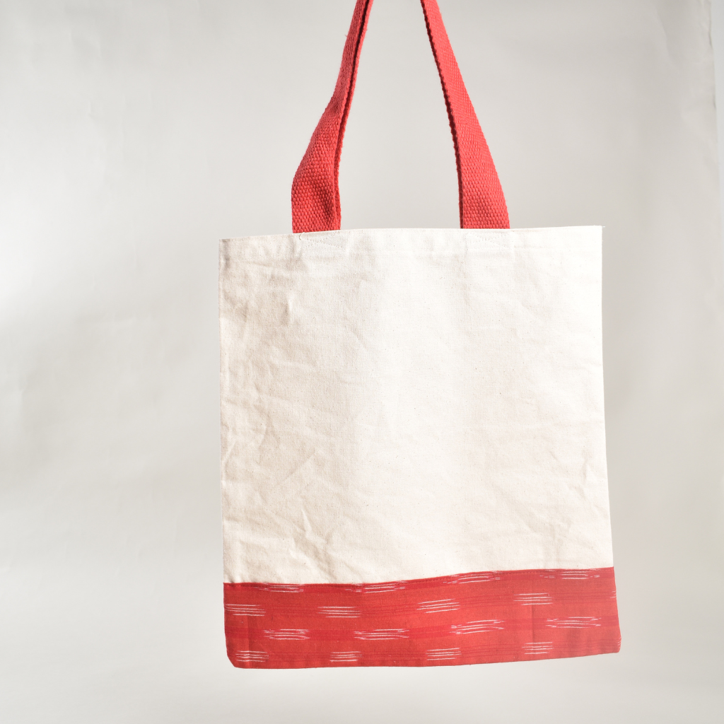 Canvas tote bag with red ikat border