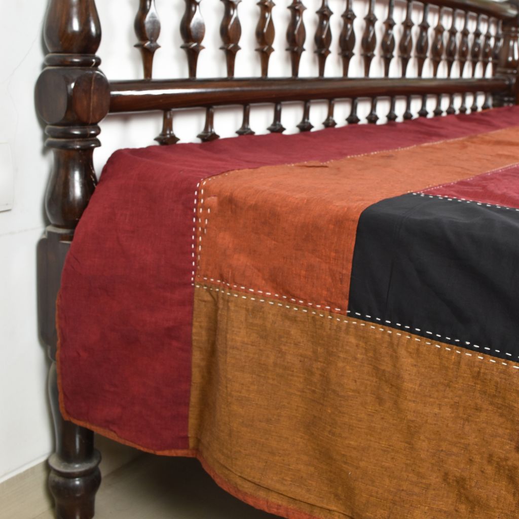 Kalamkari patchwork reversible double bedcover in maroon and black