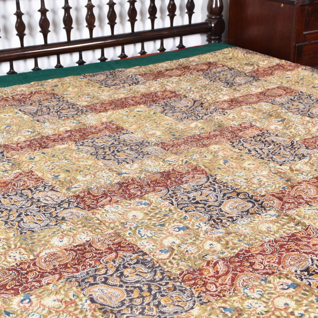 Kalamkari patchwork reversible double bedcover in orange and green