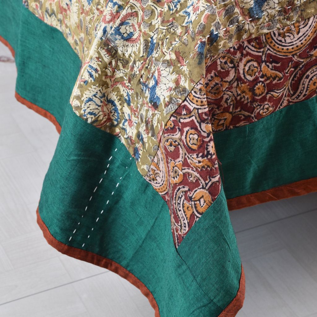 Kalamkari patchwork reversible double bedcover in orange and green