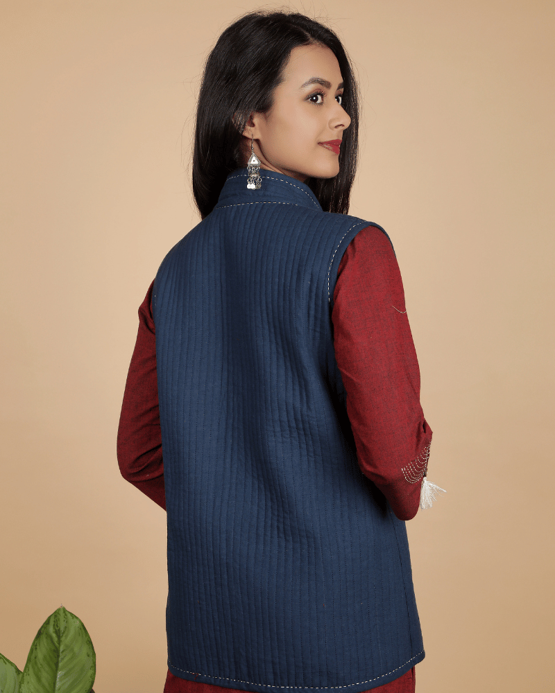 Reversible quilted jacket in blue & red kalamkari - side