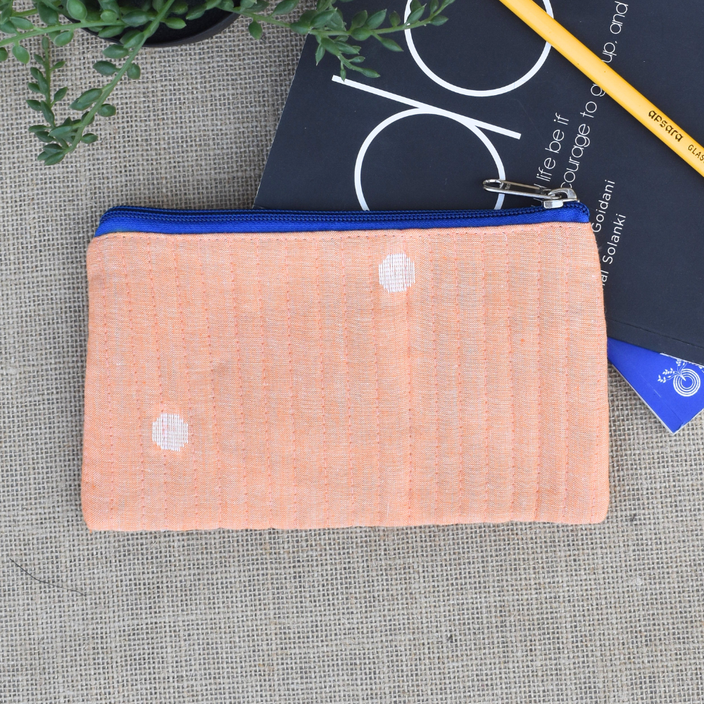 Light orange hand embroidered pouch