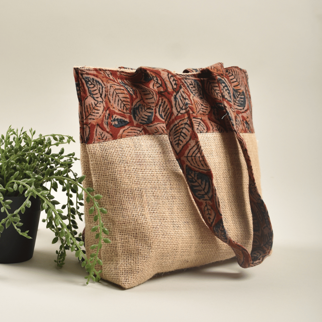 Soft jute tambulam or gift bag with red Kalamakri print