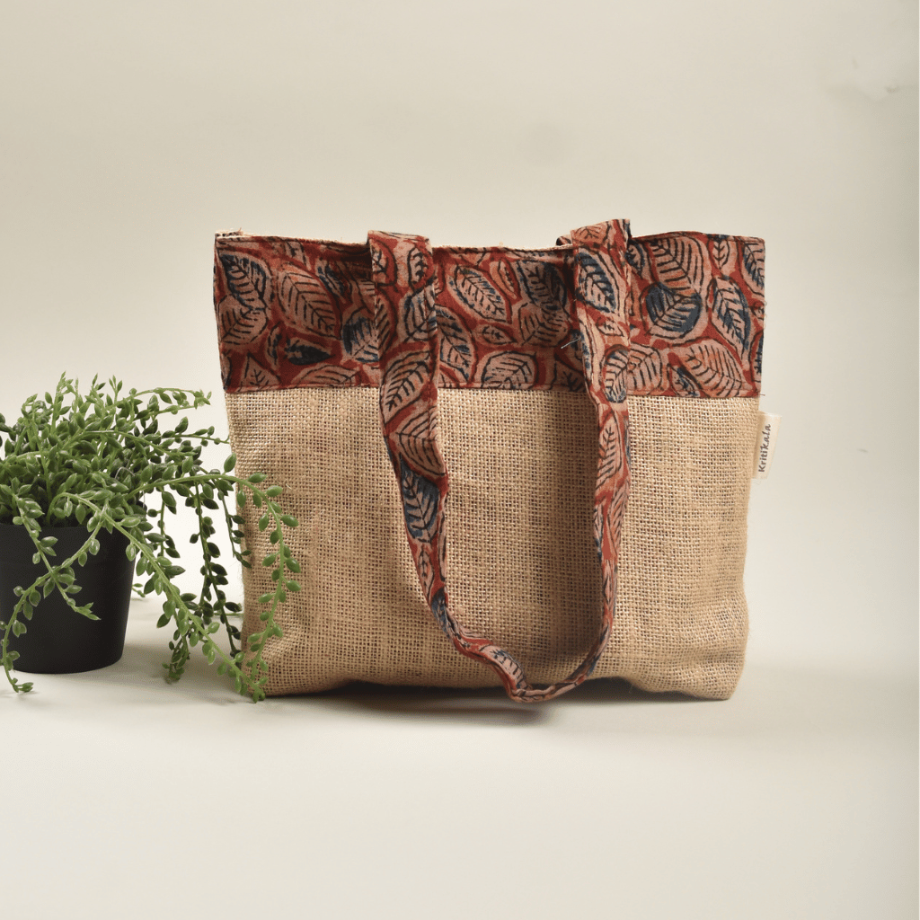 Soft jute tambulam or gift bag with red Kalamakri print