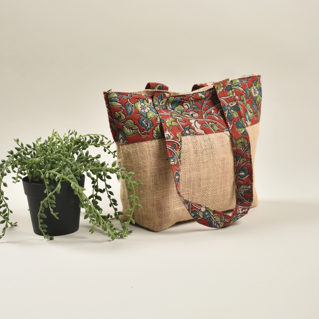 Soft jute tambulam or gift bag with red & green Kalamakri print