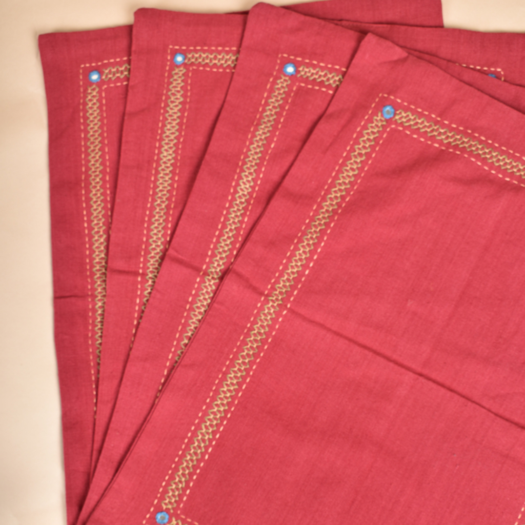Maroon table mats with mirror embroidery
