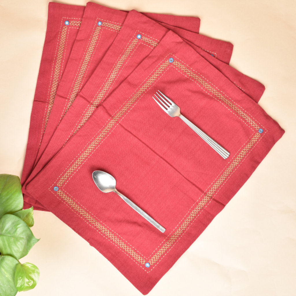 Maroon table mats with mirror embroidery