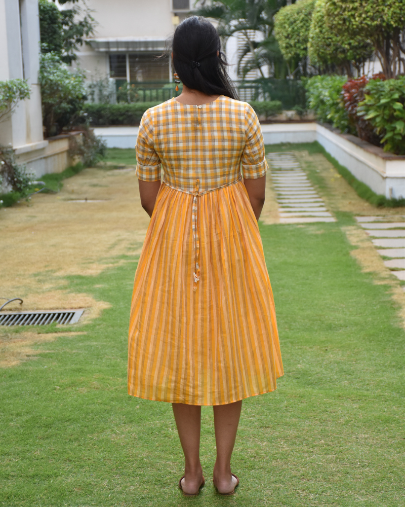 Orange checks and stripes midi dress