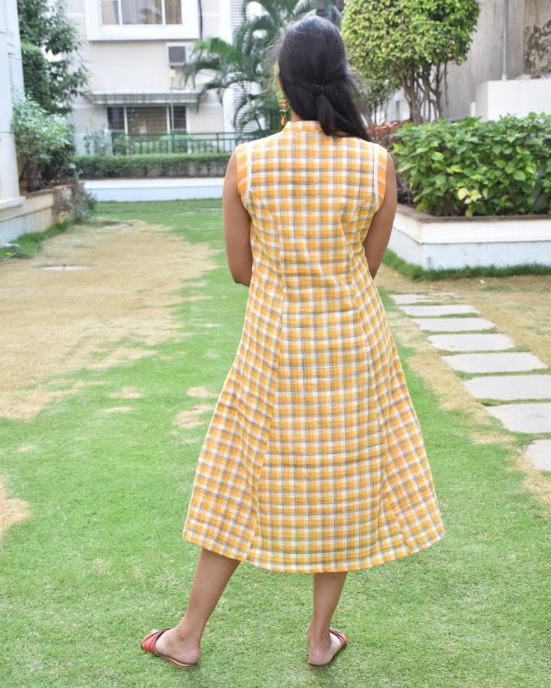 Orange checks and stripes sleeveless dress