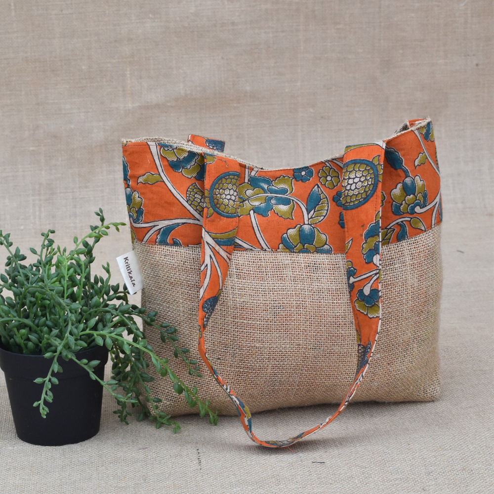 Soft jute tambulam or gift bag with orange Kalamakri print