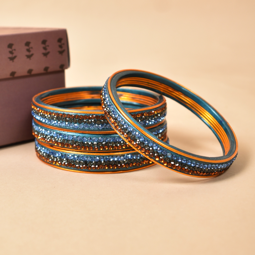 Pair of bangles with blue and golden stones