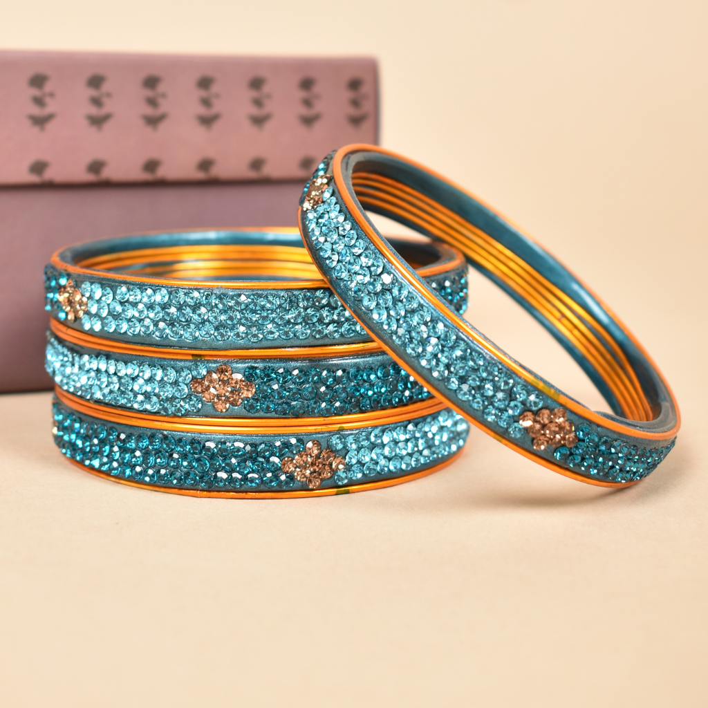 Pair of blue stone studded lac bangles