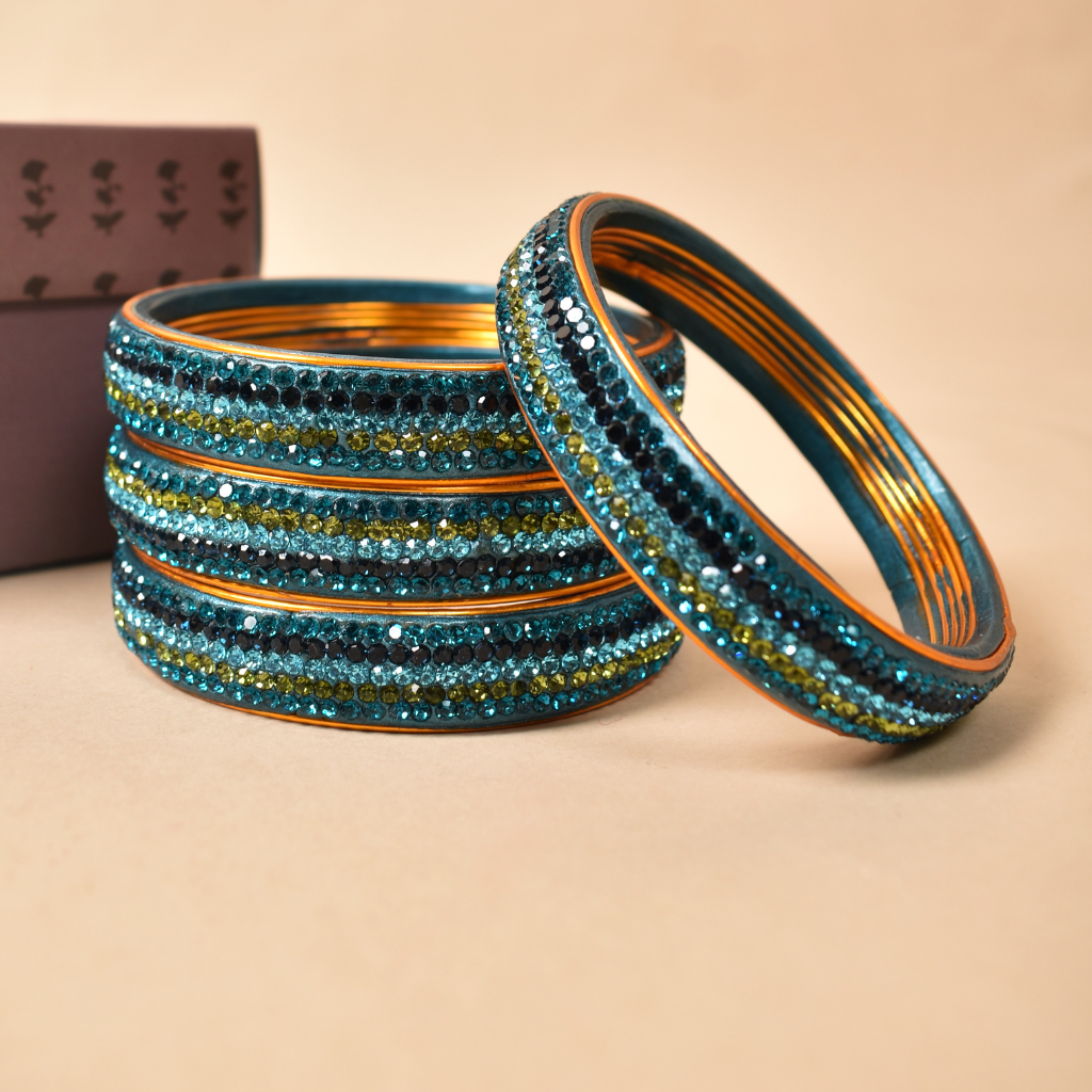 Pair of broad bangles in blue tones