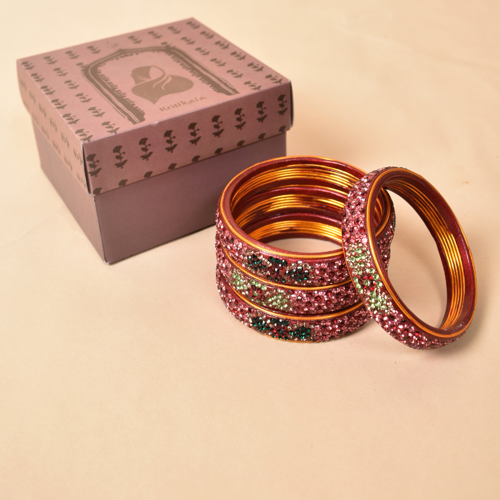 Pair of broad bangles in maroon and pink tones