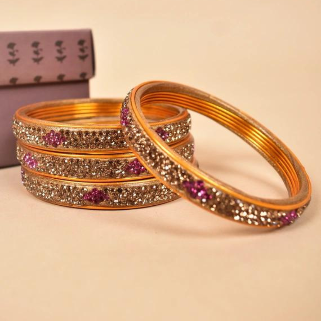 Pair of traditional lac bangles in golden tones