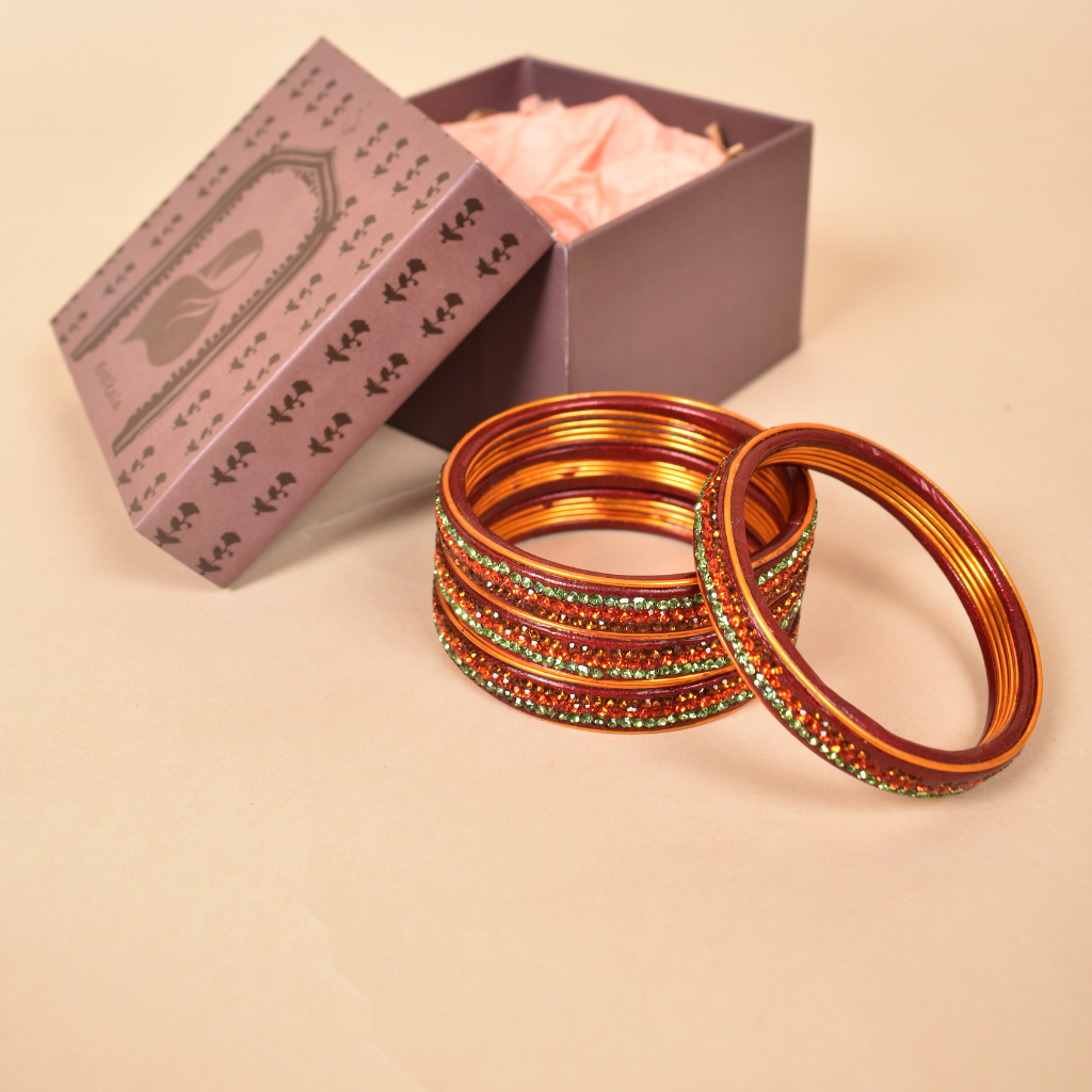 Pair of traditional lac bangles in pink and gold tones