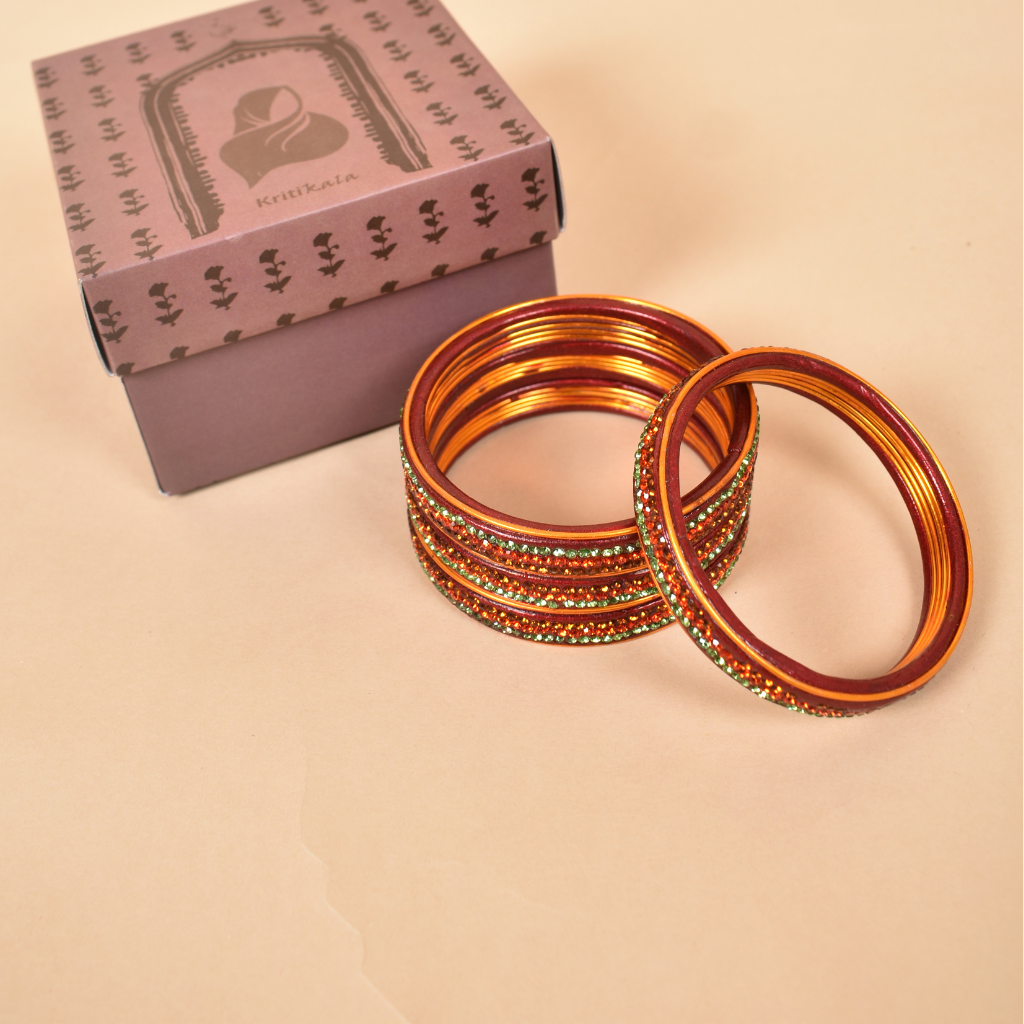 Pair of traditional lac bangles in pink and gold tones