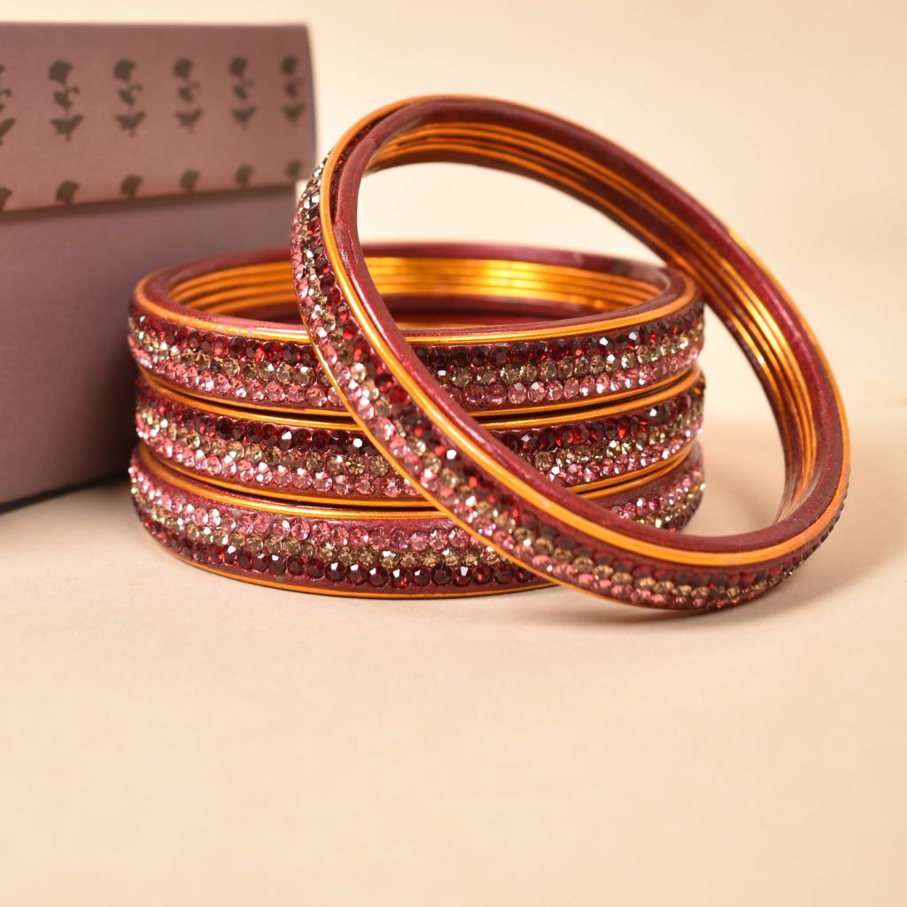 Pair of traditional lac bangles in pink and red tones