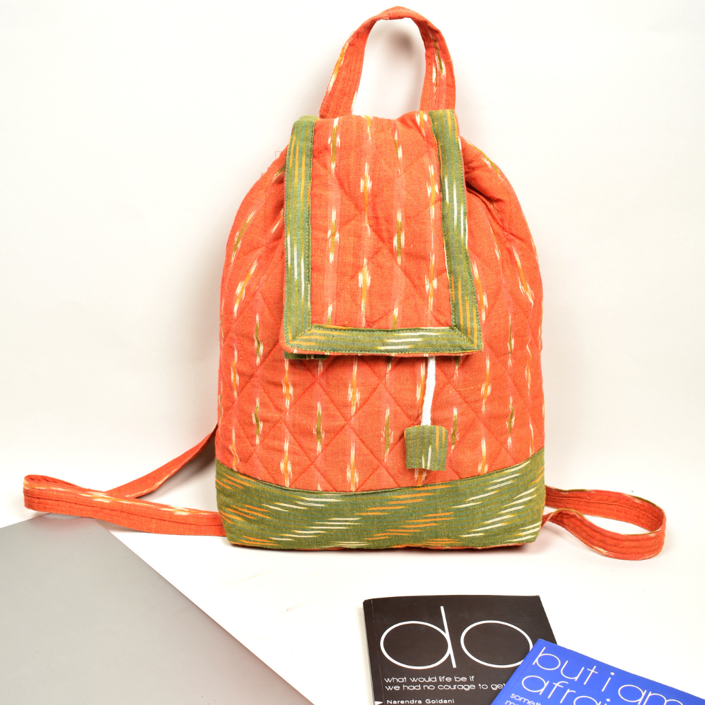 QUILTED ORANGE AND GREEN IKAT BACKPACK BAG