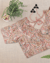 Pink kalamkari blouse with flower tassels - FRONT